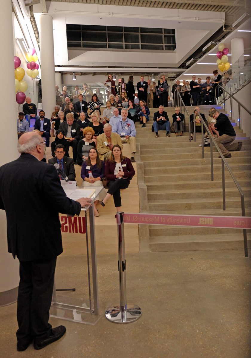Nearly 300 attendees of the grand opening poured on to the steps and back into the halls of the new Science Learning Building as College of Arts and Sciences Dean Ron Yasbin addressed the crowd in the solarium area of the "Town Center," which connects the SLB to Benton and Stadler halls, forming the science complex.