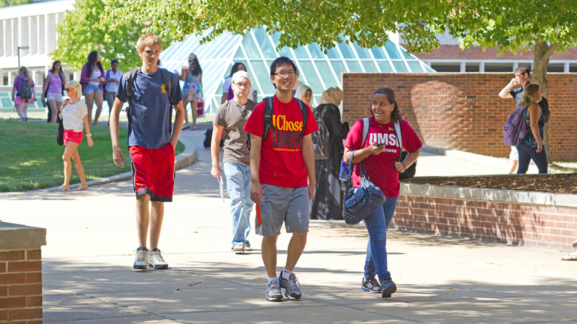 students walking on UMSL Quad