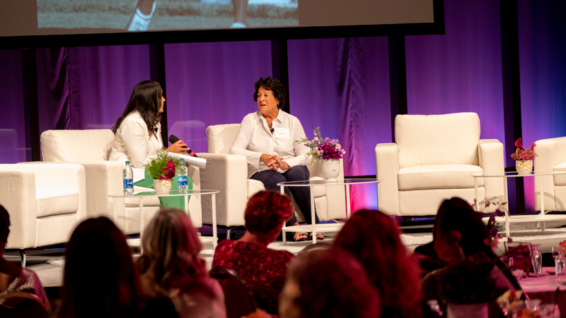 Nancy Lopez is interviewed on stage in the E. Desmond and Mary Ann Lee Theater