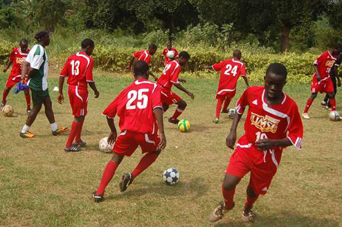 Soccer players from Uganda wearing donated UMSL uniforms