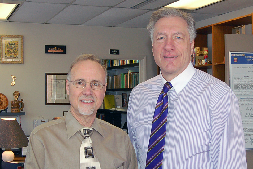 Chancellor Tom George (left) and Martin Leifeld, vice chancellor for University Advancement,