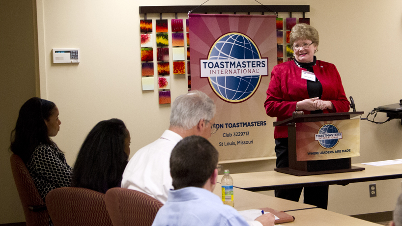 Celeste Marx, associate director of alumni relations at UMSL, competes in the evaluation contest at the Triton Toastmasters