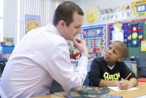UMSL teacher candidate Matt Johnson works with a second grade student