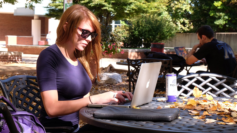 Students using computers in the Quad