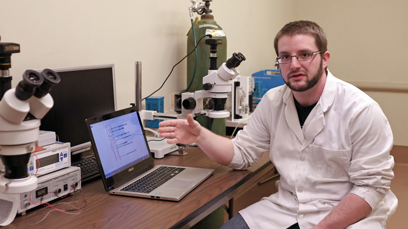 Jacob Huffman, UMSL psychology major, received a College of Arts and Sciences research grant. His study exams the positive and negative effects nicotine on stroke victims. (Photo by August Jennewein)