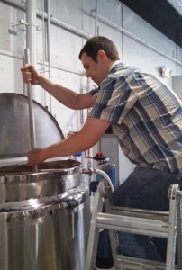 While Nathan Letcher celebrated graduation afar, he brewed one of the first batches of beer to go on tap at Iowa City Brewlab. He's been home-brewing beer for seven years.