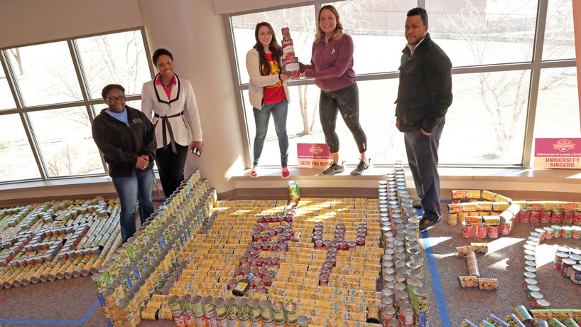 ‘CANstruction’ competitors assemble 10,000 cans for a good cause