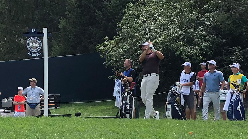 Michael Block holds his follow-through after hitting a tee shot at Bellerive Country Club