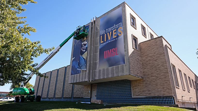 New ‘We Transform Lives’ mission statement on display on university buildings