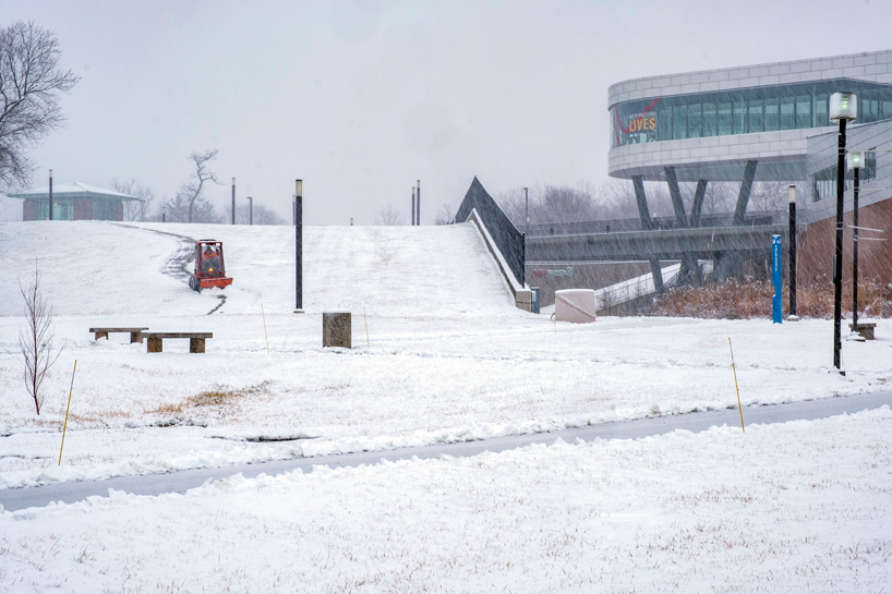 Clearing snow outside the Recreation and Wellness Center