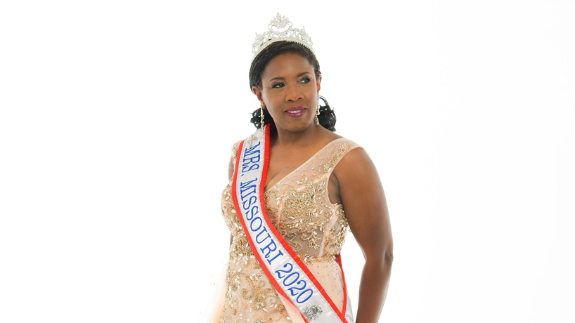 Mrs. Missouri America and UMSL graduate Wauneen Rucker fixes her crown to vie for a national title