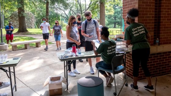 New student and mother check-in on move-in day