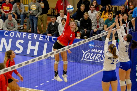 Charlotte Richards spiking the ball against Rockhurst