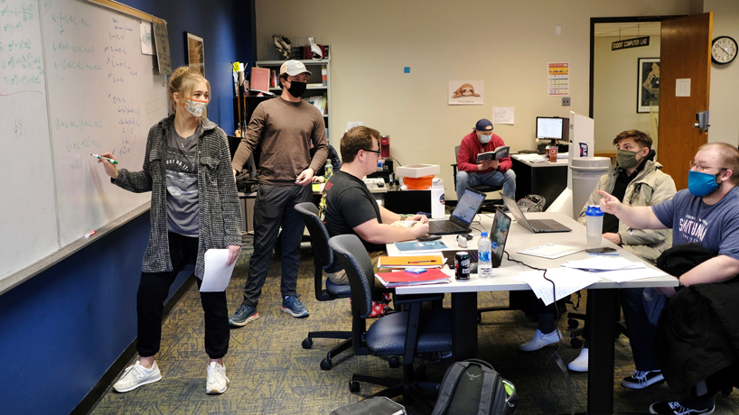 Students Ashlee Sprock, Jacob Krutzsch, Holden Mayberry, Dillon Pierce, Bryan Pierce, Nikolos Culp and Joel Fecke study in the Economics Resource Center, 