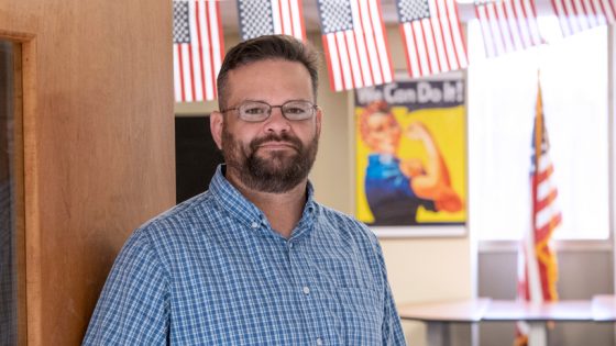 Benjamin Ebert stands in the UMSL Veteran's Center