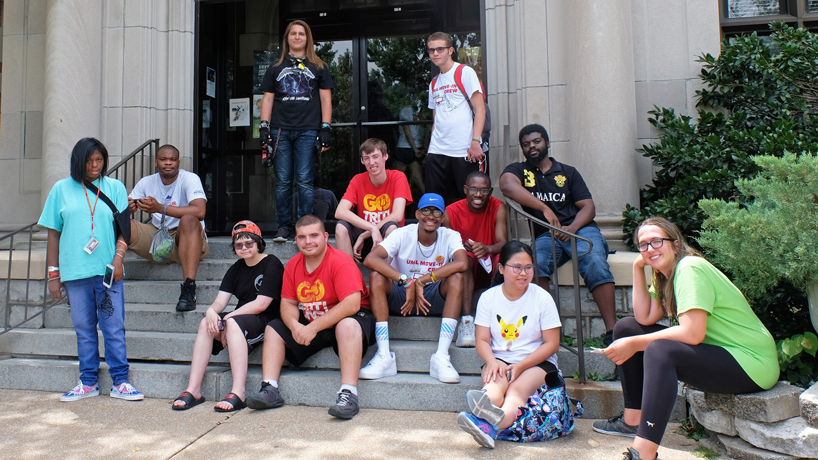 UMSL Succeed students gather on the steps outside the Provincial House