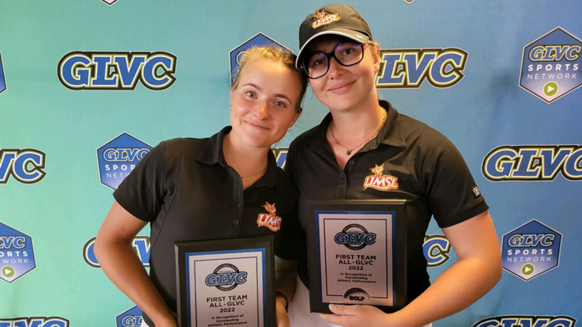 Golfers Tove Brunell and Juliette Lecomte hold their all-conference plaques