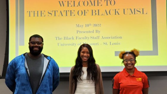 Three students who received BFSA scholarships stand and smile.