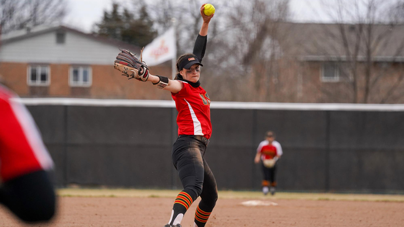 Lefthanded pitcher Annie Scaramuzzi winds up before delivering a pitch