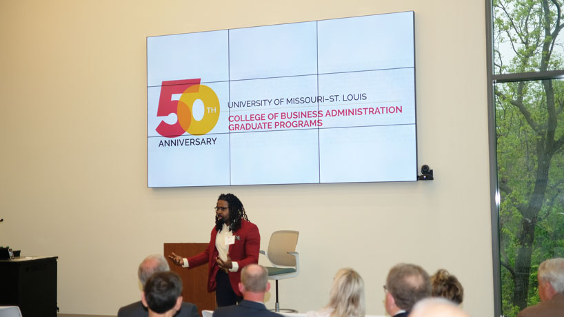 Kevin Sansberry II speaks at the 50th anniversary celebration of UMSL's graduate business programs