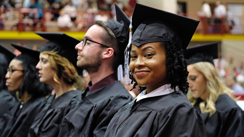 UMSL graduates smiling