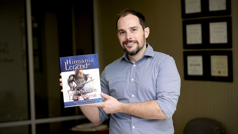 Through children’s book series, nursing faculty member Joshua Minks translates health problems for younger audience