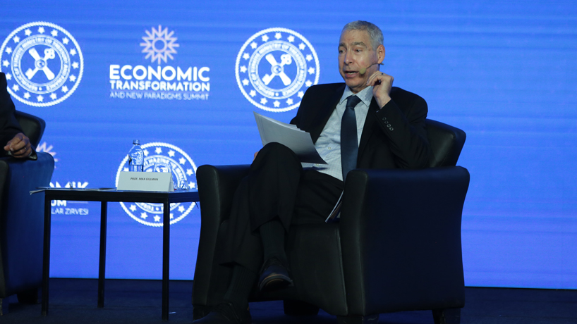 Professor Max Gillman speaks on stage during a panel of the Economic Transformation summit in Turkey