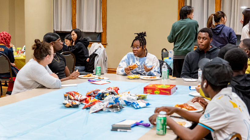 A group of Bahamian students gather in the Museum Room at the Provincial House