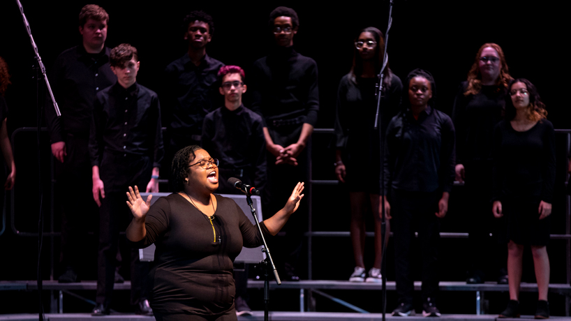 UMSL music student Arissa Ford-Jones performs "I'm here" at the Dr. Martin Luther King Jr. Holiday Observance