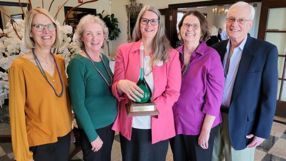 Elizabeth Petersen holds the Dr. Jane A. Miller Award while surrounded by Joan Twillman, Jeanette Hencken, Sandra Mueller and Charles Granger
