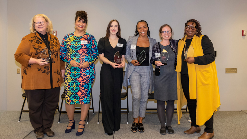 2023 Trailblazer Award recipients Kristin Sobolik, Felia Davenport, Sydney Stark, Shawntelle Fisher, April Regester and Tanisha Stevens stand together with their awards