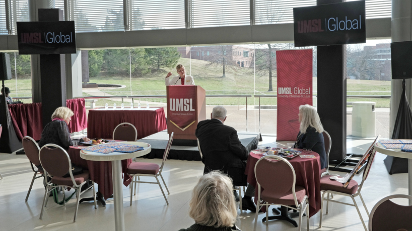UMSL Global Executive Director Liane Constantine welcomes guests to the UMSL Global Faculty Reception