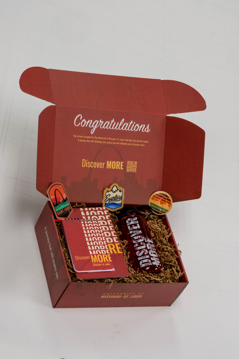 A new admit box designed by UMSL Marketing and Communications