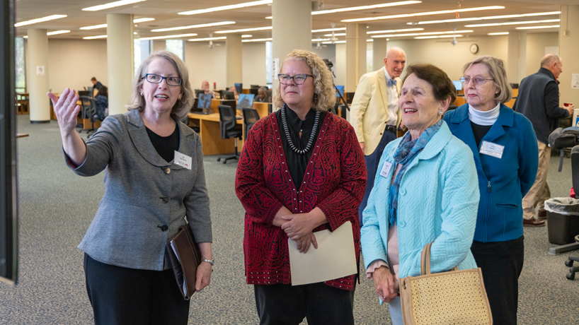 Julie Dunn-Morton talks to Kristin Sobolik and members of the St. Louis Mercantile Library board about plans for the renovation of UMSL Libraries