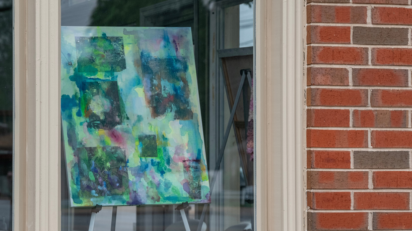Art by Sarah Butler is displayed in the storefront of Soulcraft in Ferguson, Missouri