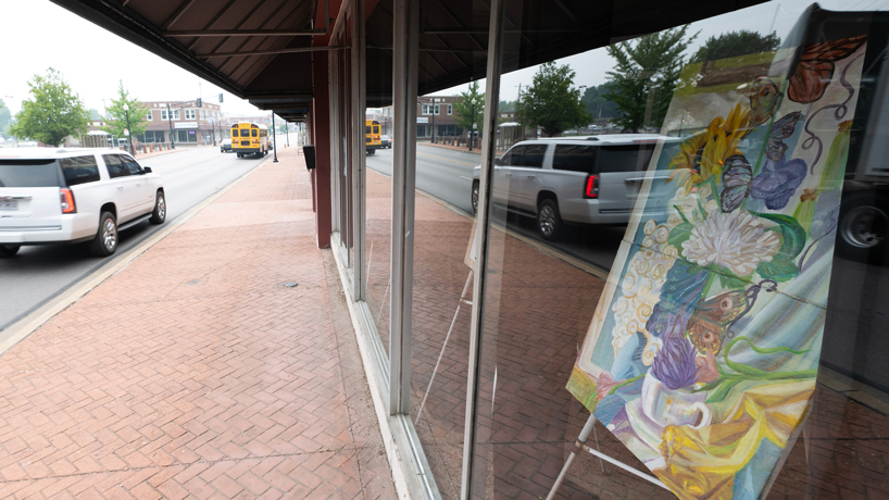 A piece of art by Olivia Obi displayed in the window of the Xcelsior Event Center in Ferguson, Missouri
