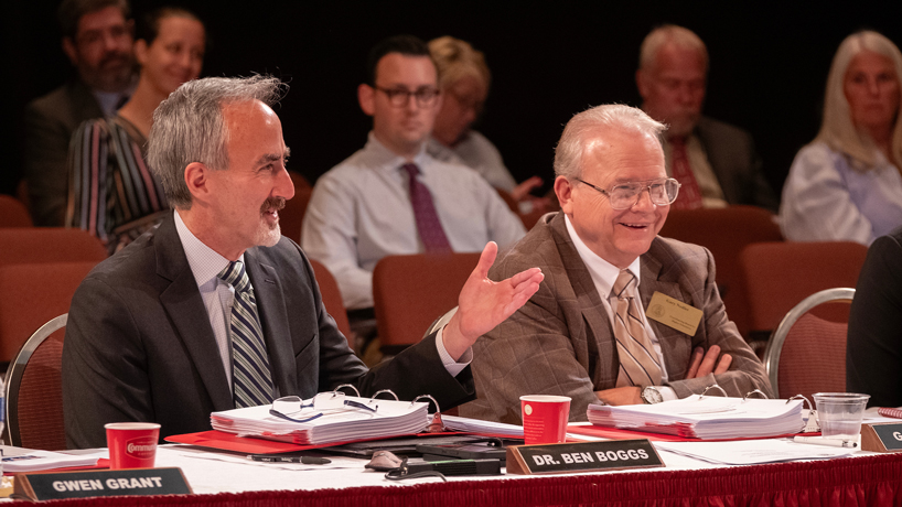 Bennett Boggs, commissioner of higher education and workforce development, speaks and gestures with his hand during a meeting of the Coordinating Board for Higher Education