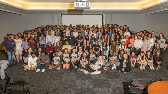 Members of UMSL Global pose for a photo with new international students during Global Triton Welcome