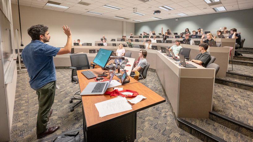 New Assistant Teaching Professor Gabriel Attoun welcomes students to an Information Systems Concepts class on the first day of the fall 2023 Semester
