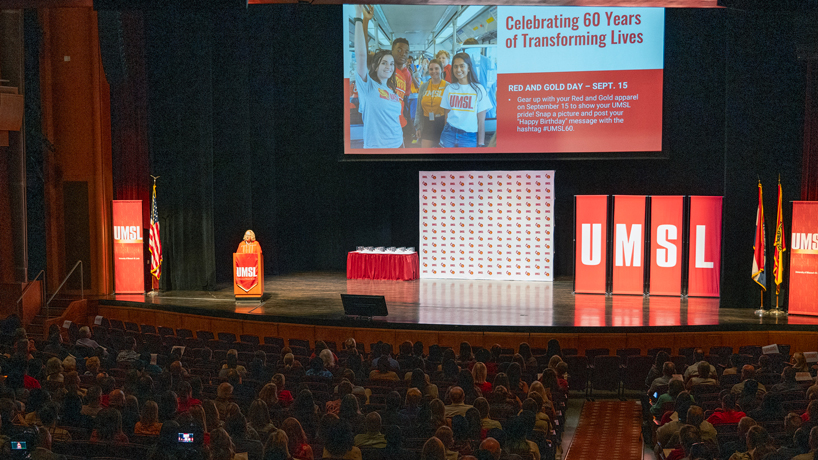Chancellor Kristin Sobolik delivers the State of the University Address in front of a large audience at the Blanche M. Touhill Performing Arts Center