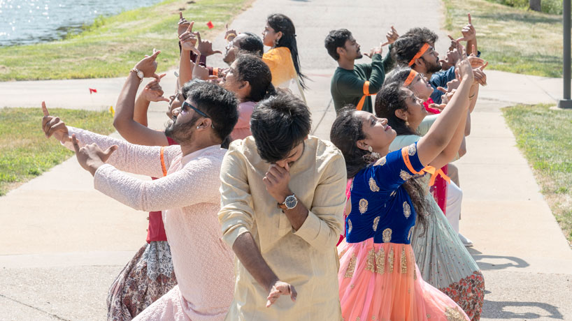 UMSL students in traditional Hindu dress preform a dance to honor the deity Ganesha