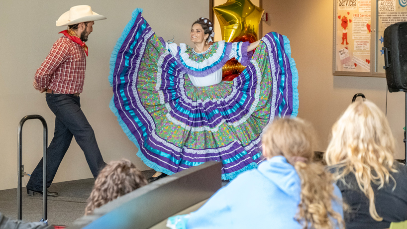 Juanjo Gonzalez and Amber Nelson of Alma de Mexico perform a traditional dances for UMSL students to help kick off Hispanic Heritage Month in the Millennium Student Center