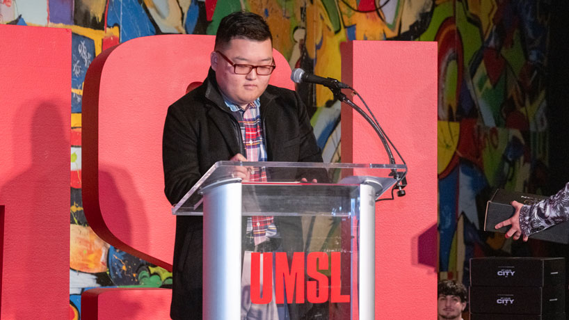 Joseph Lee becomes the first signee to a book containing the signatures of all the players who are part of UMSL's inaugural esports team