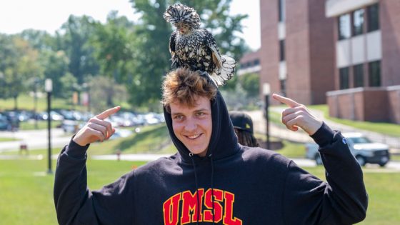 Student at petting zoo on campus