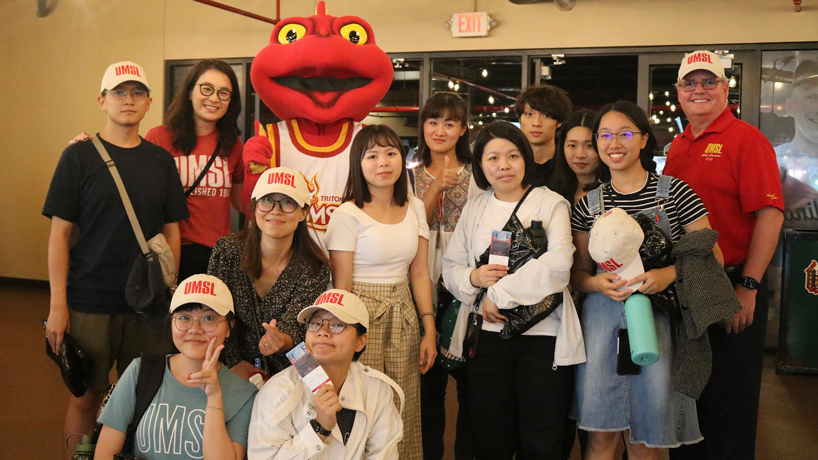 International students with Louie at UMSL Night at the Ballpark