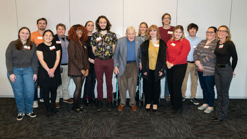 Retired Gov. and Sen. Christopher "Kit" Bond stands with Bond International Scholars from the University of Missouri–St. Louis and the University of Missouri–Columbia