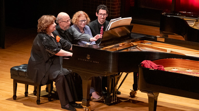 Alla Voskoboynikova, Daniel Schene, Susan Lutz and Daniel Kuehler perform “Galop-Marche for Eight Hands” by Albert Lavignac during the All-Steinway Extravaganza last Thursday at the Blanche M. Touhill Performing Arts Center