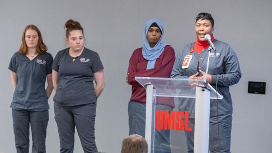 Brittney Bounds speaks at podium