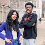 Engineering students Bushra Zaidi and Lorne St. Christopher II standing on the campus of Washington University
