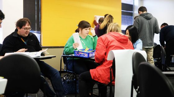 education students sitting at desks